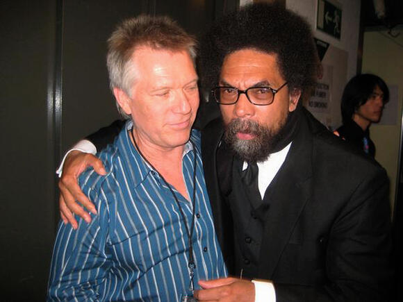 Larry and Dr. Cornel West at Quincy Jones' 75th birthday celebration, Montreaux, Switzerland.